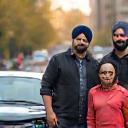 Mr. Singh with his family and car in Bristol